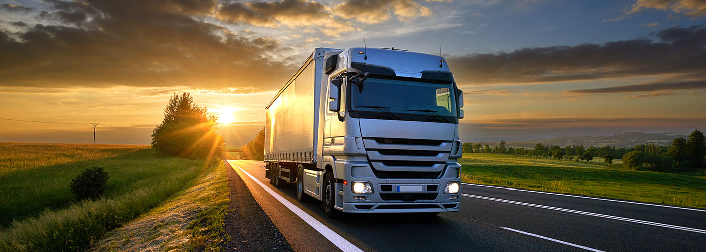 Cornerstone Logistics - Truck on asphalt delivering shipment